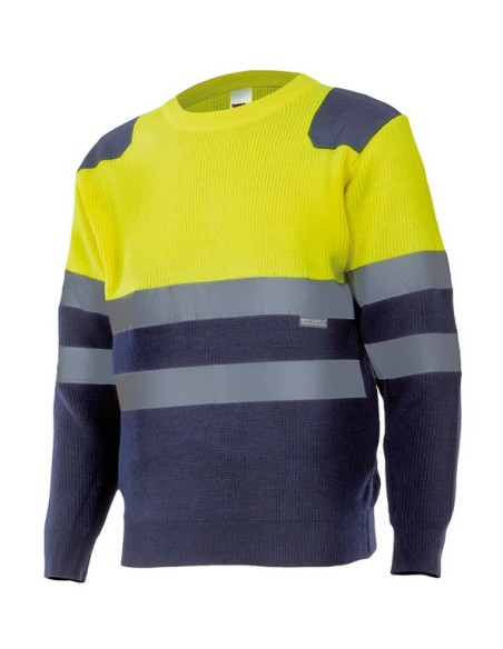 Jersey bicolor de punto de alta visibilidad con cintas reflectantes en torso y mangas. Con puños de canalé y refuerzo de tejido
