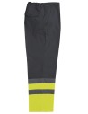 - Pantalón bicolor de alta visibilidad, elástico en la cintura y pespunte trasero de seguridad. cintas reflectantes en el bajo.